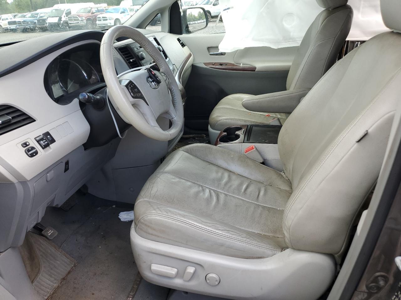 2014 Toyota Sienna VIN 5TDYK3DC9ES445263 Copart auction photo, biohazard/chemical / side damage thumbnail 7