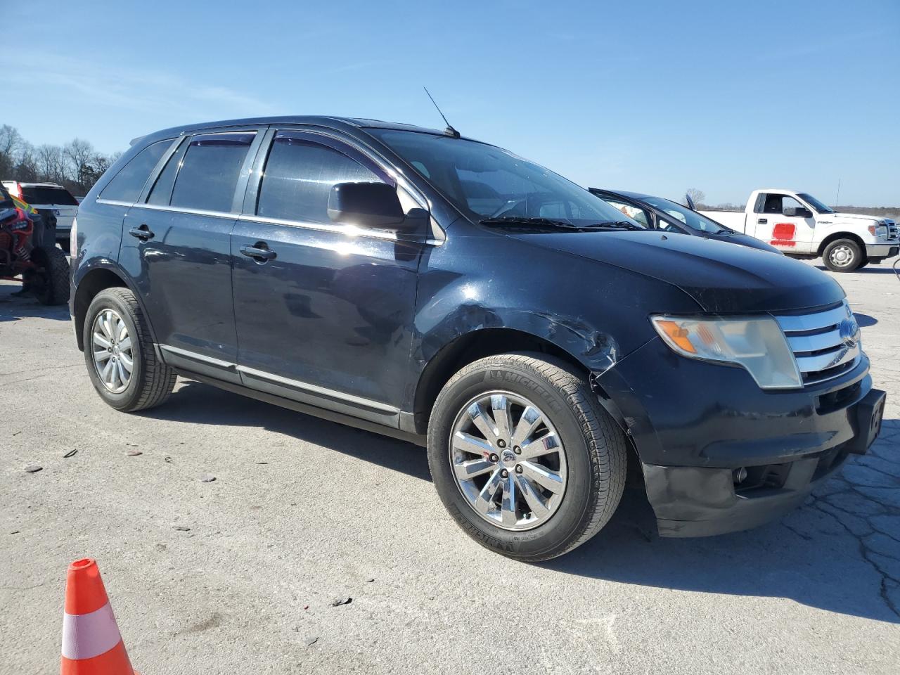 2009 Ford Edge VIN 2FMDK39C39BA66690 Copart auction photo, front end / minor dent/scratches damage thumbnail 4
