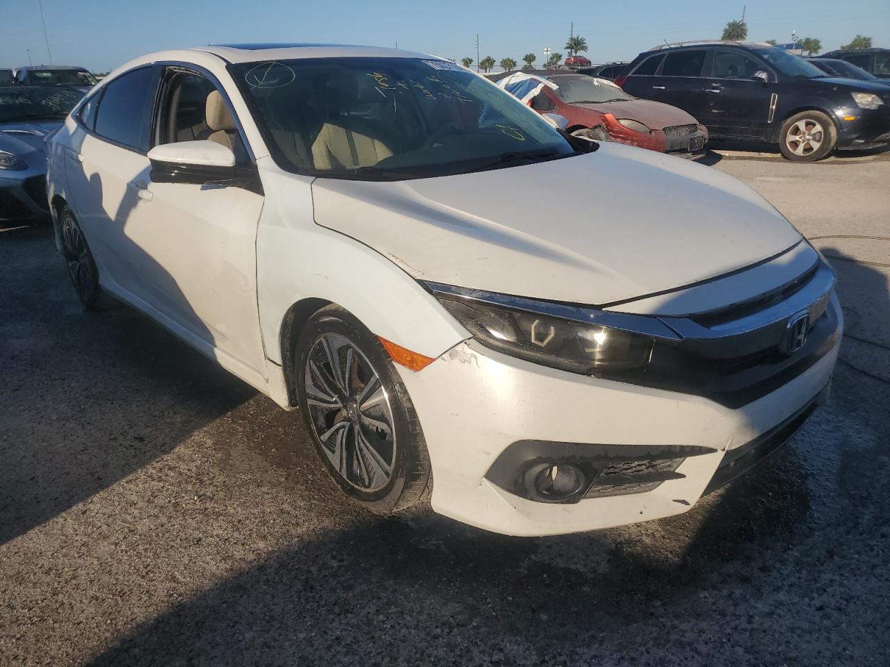 2017 Honda Civic VIN 19XFC1F38HE023554 Copart auction photo, water/flood damage thumbnail 4