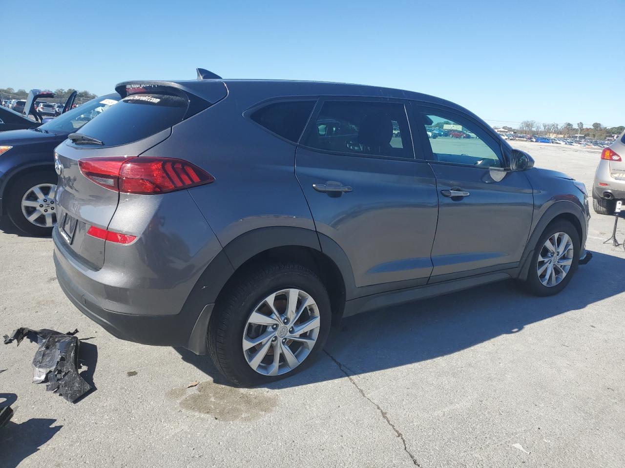 2021 Hyundai Tucson VIN KM8J23A41MU337885 Copart auction photo, front end / side damage thumbnail 3