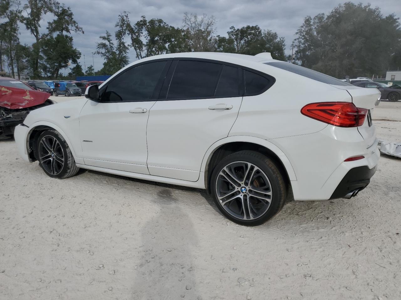 2018 BMW X4 VIN 5UXXW3C57J0T80573 Copart auction photo, front end / minor dent/scratches damage thumbnail 2