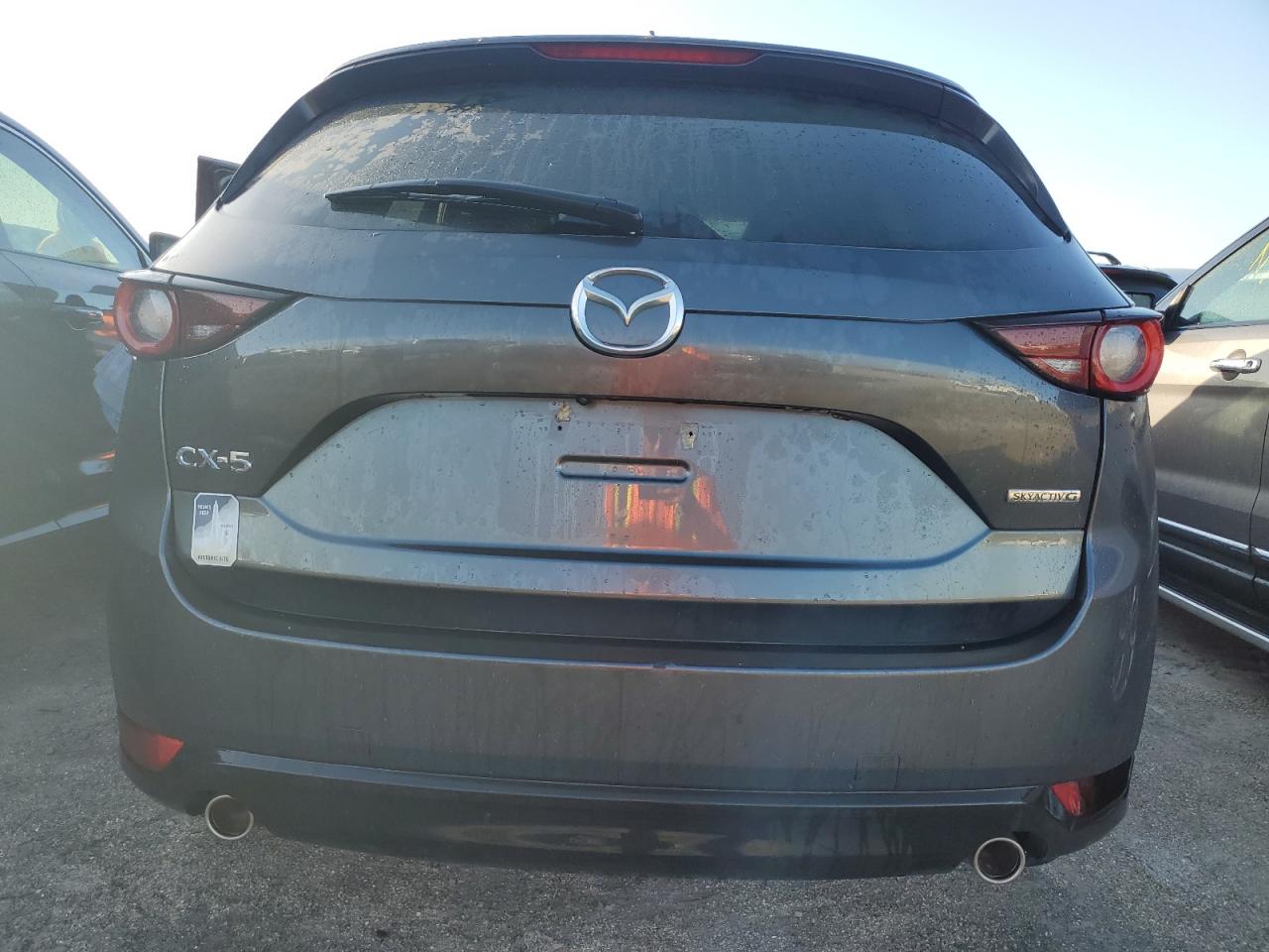 2021 Mazda CX-5 VIN JM3KFACM8M0450603 Copart auction photo, water/flood damage thumbnail 6