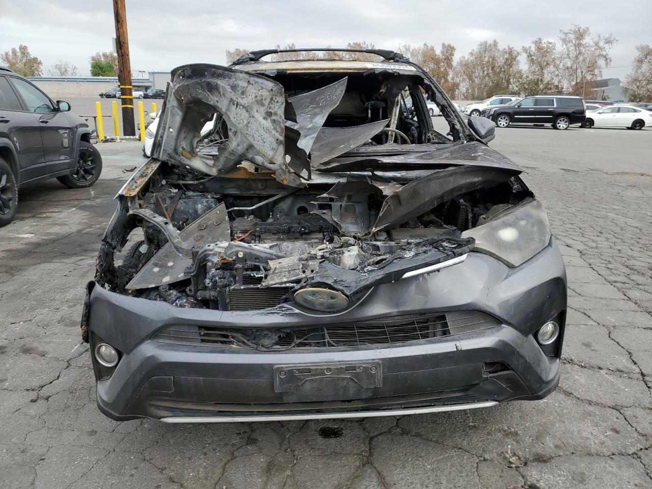 2017 Toyota RAV 4 VIN JTMRJREV9HD063664 Copart auction photo, burn damage thumbnail 5
