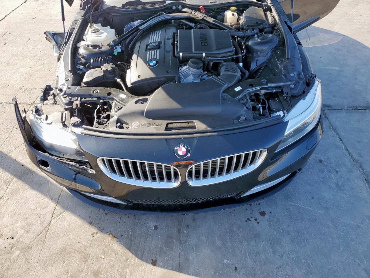 2014 BMW Z4 VIN WBALM7C51EE386386 Copart auction photo, front end damage thumbnail 12