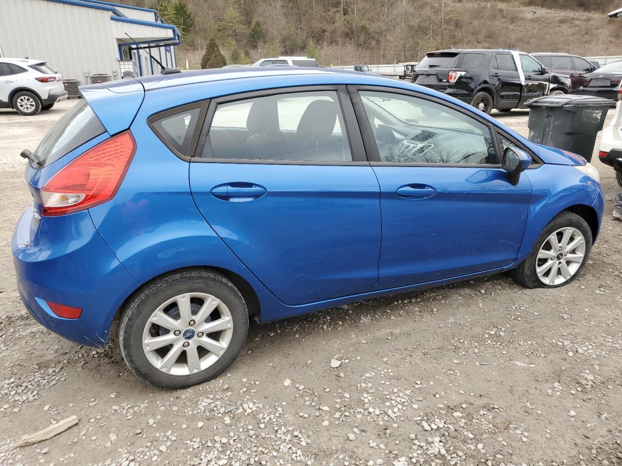 2011 Ford Fiesta VIN 3FADP4EJ1BM103746 Copart auction photo, side damage thumbnail 3