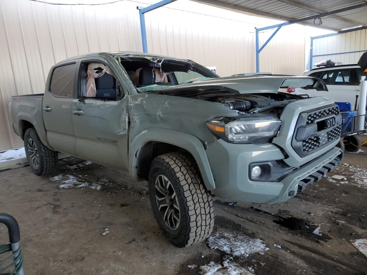 2023 Toyota Tacoma VIN 3TMCZ5AN5PM538629 Copart auction photo, rollover damage thumbnail 4