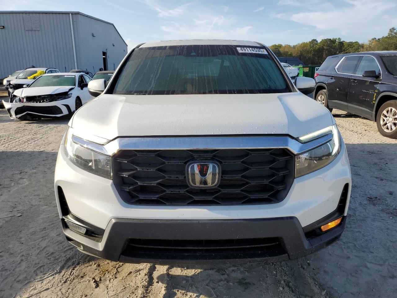 2022 Honda Passport VIN 5FNYF7H58NB002422 Copart auction photo, minor dent/scratches damage thumbnail 5