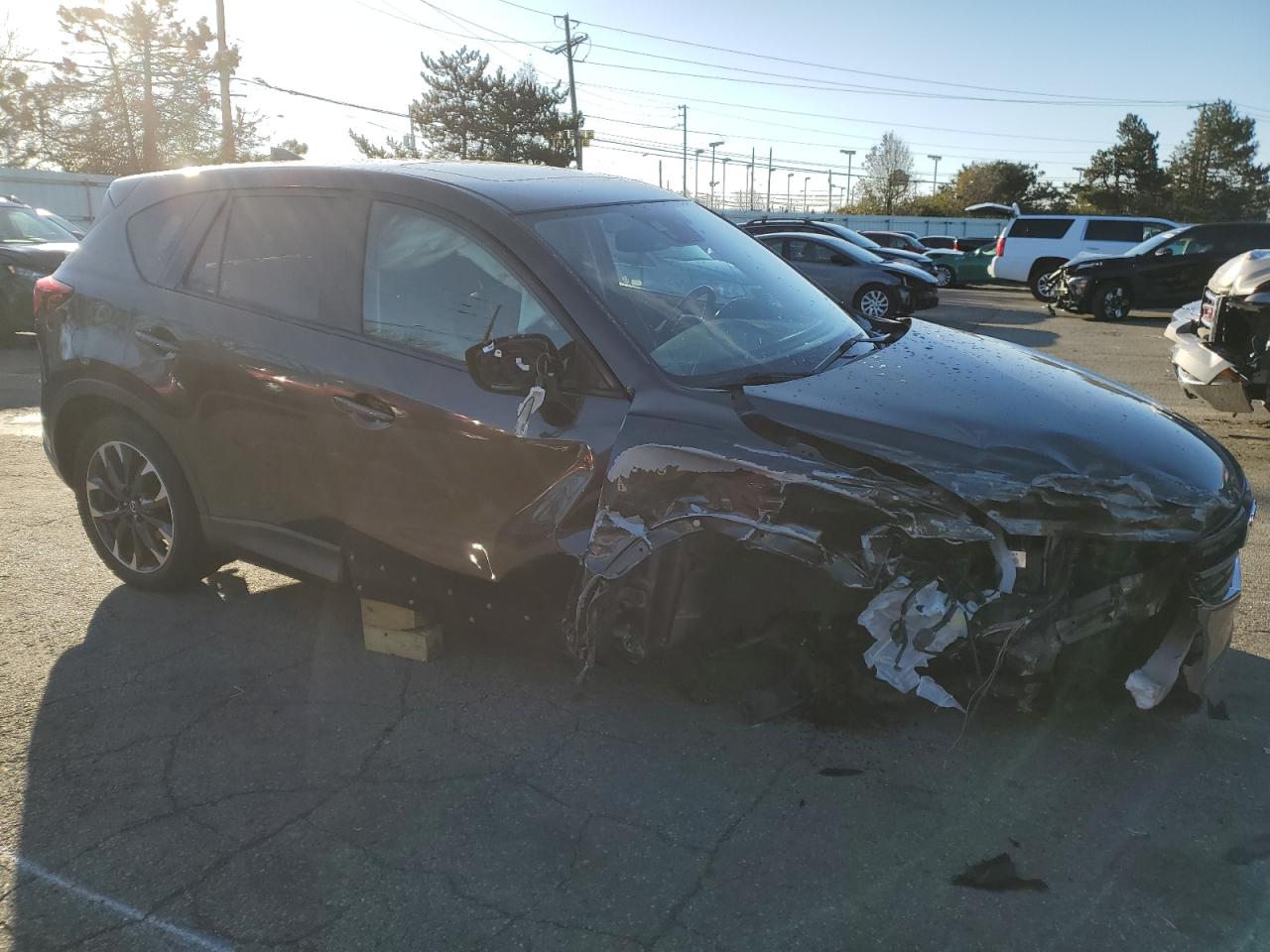 2016 Mazda CX-5 VIN JM3KE4DY3G0722887 Copart auction photo, all over / undercarriage damage thumbnail 4