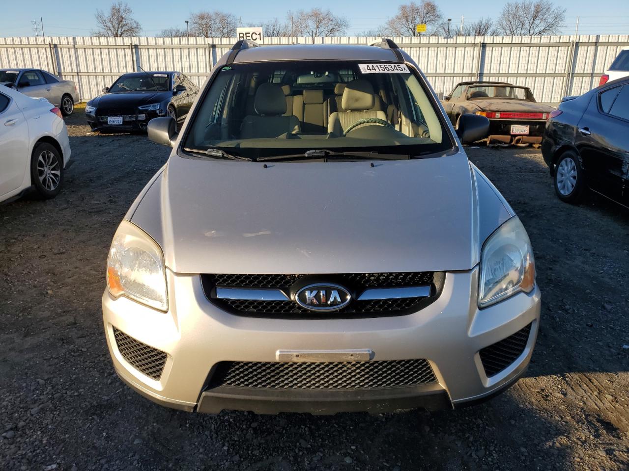 2010 KIA Sportage VIN KNDKGCA37A7669339 Copart auction photo, side damage thumbnail 5