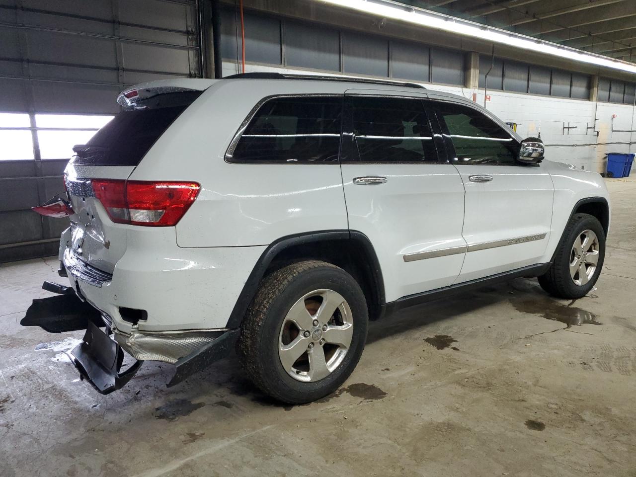 2013 Jeep Grand Cherokee VIN 1C4RJFBG0DC568335 Copart auction photo, rear end / mechanical damage thumbnail 3
