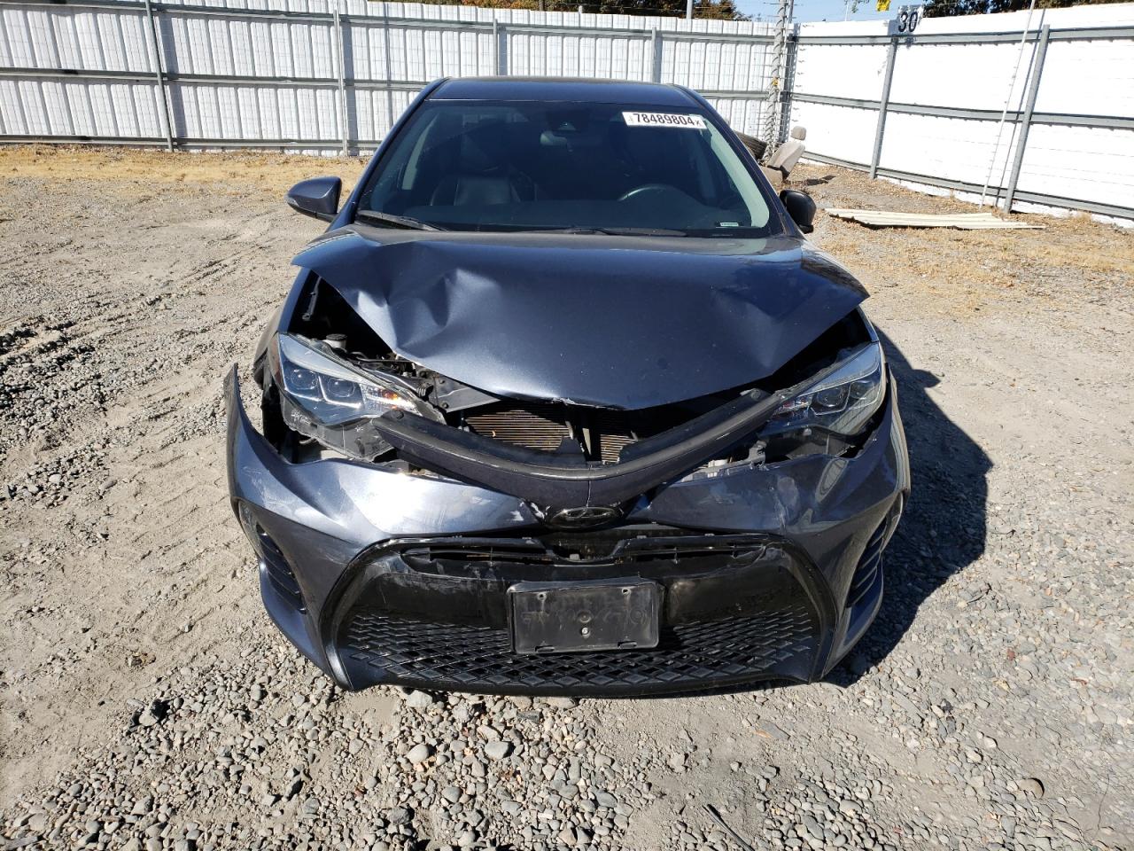 2017 Toyota Corolla VIN 5YFBURHE4HP701093 Copart auction photo, rear end / front end damage thumbnail 5
