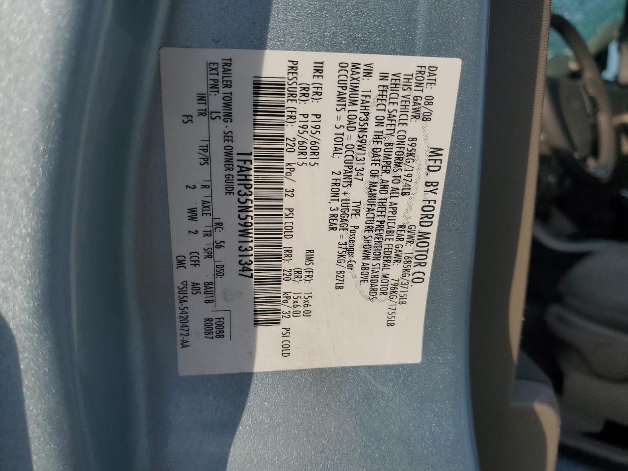 2009 Ford Focus VIN 1FAHP35N59W131347 Copart auction photo, all over / mechanical damage thumbnail 14