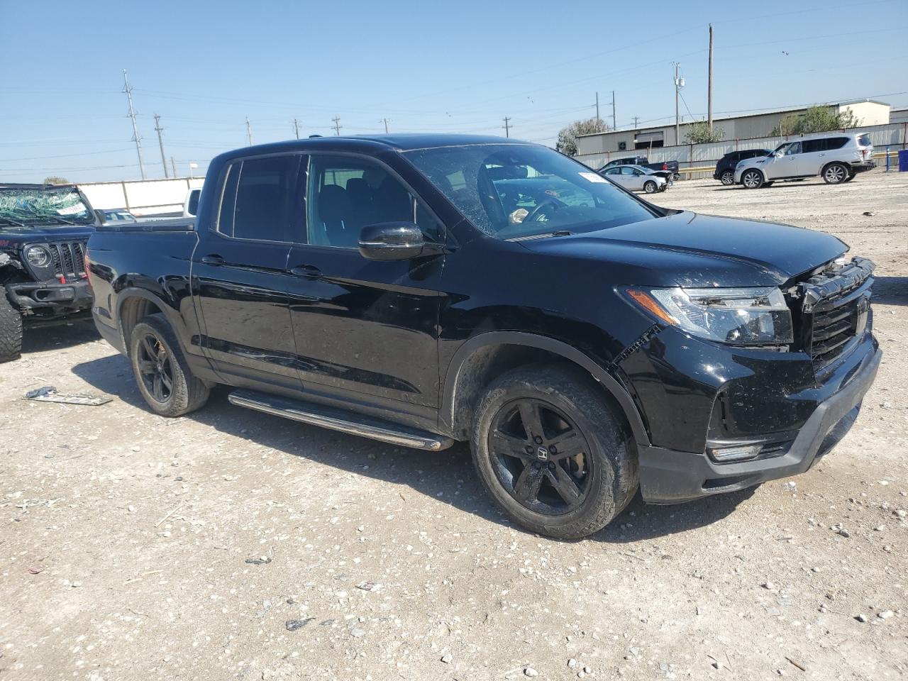 2022 Honda Ridgeline VIN 5FPYK3F83NB039533 Copart auction photo, front end / top/roof damage thumbnail 4