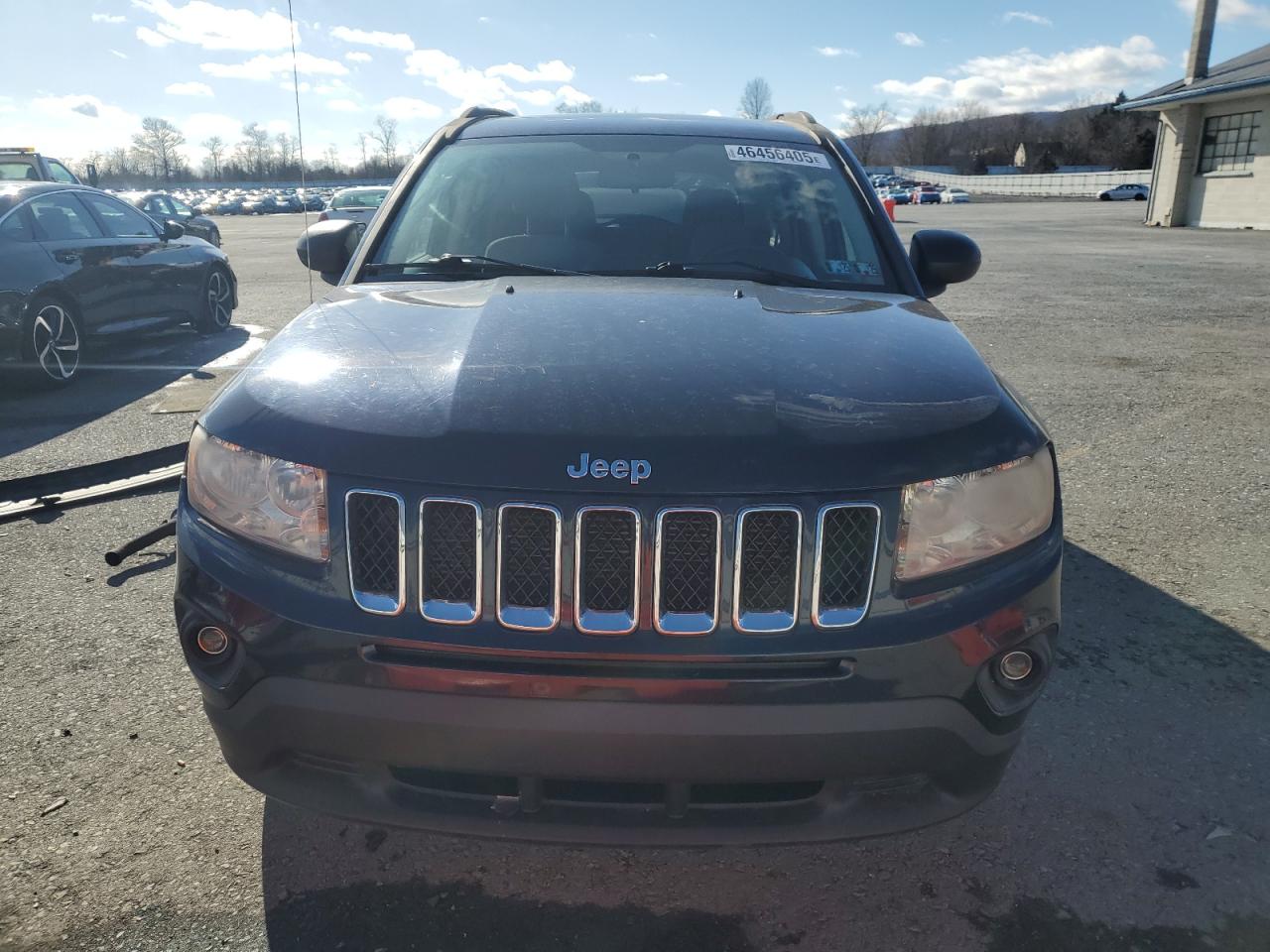 2011 Jeep Compass VIN 1J4NT1FB7BD170857 Copart auction photo, undercarriage / rear end damage thumbnail 5