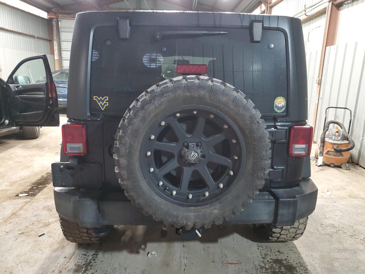 2016 Jeep Wrangler VIN 1C4BJWDG5GL196624 Copart auction photo, front end / undercarriage damage thumbnail 6