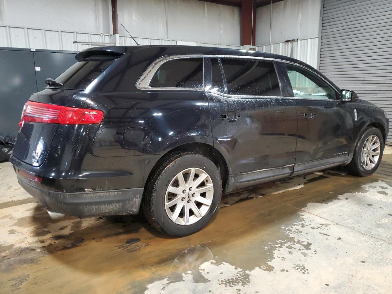 2016 Lincoln MKT VIN 2LMHJ5NK7GBL02854 Copart auction photo, side damage thumbnail 3