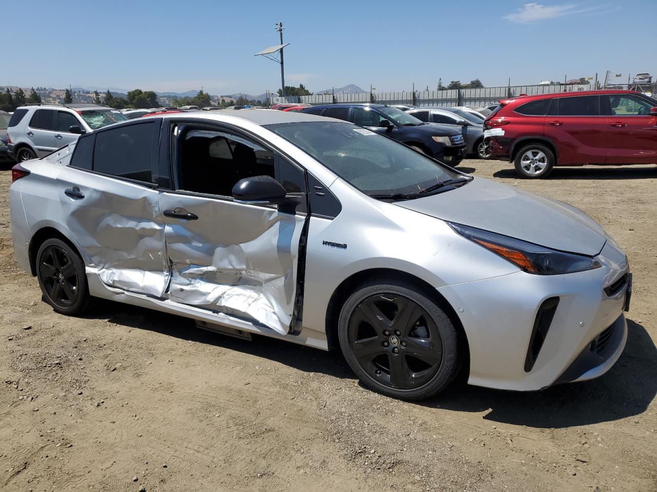 2022 Toyota Prius VIN JTDKAMFUXN3168581 Copart auction photo, side damage thumbnail 4
