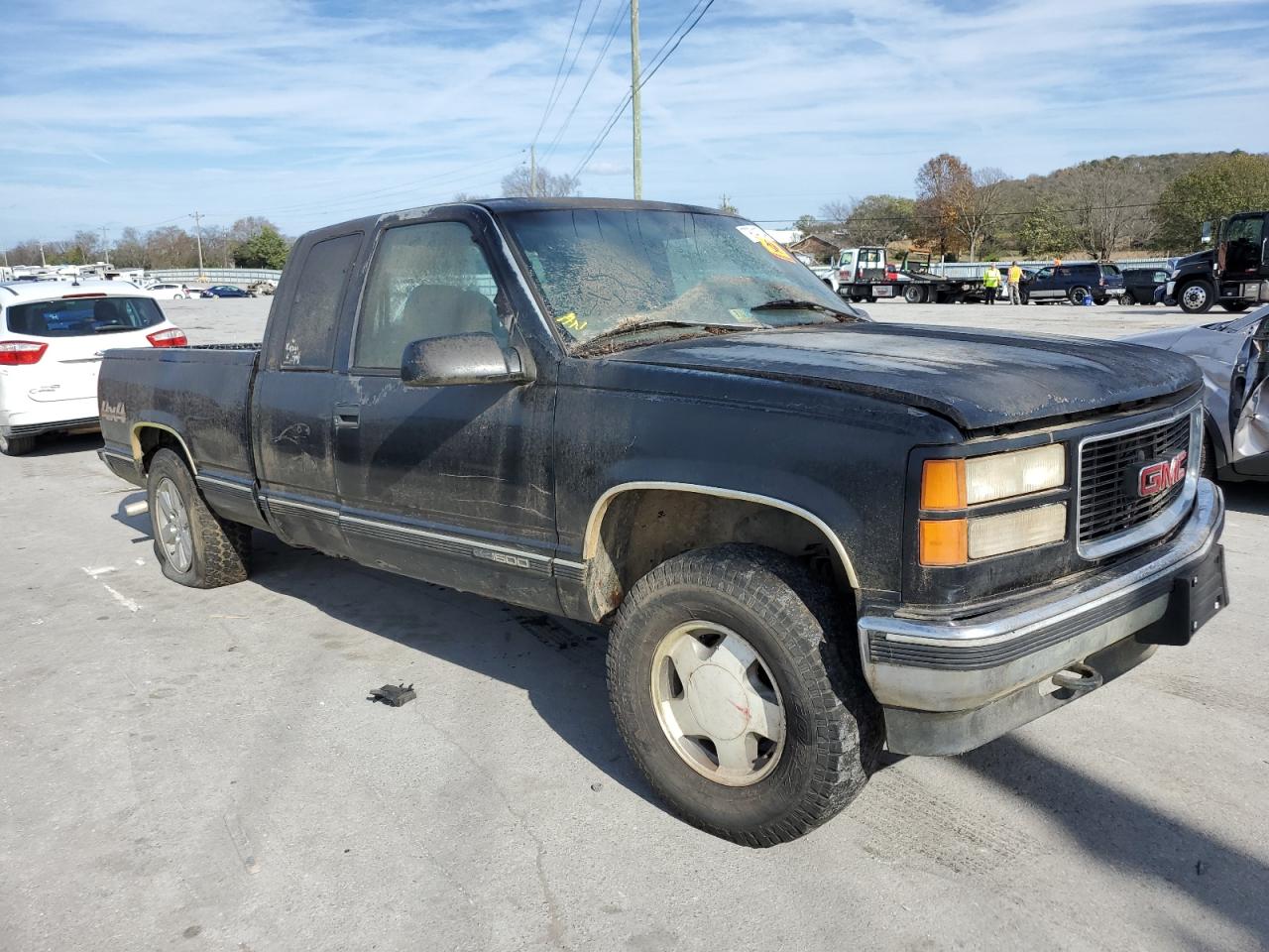 1999 GMC Sierra VIN 1GTEK19R4XR503222 Copart auction photo, rear end / minor dent/scratches damage thumbnail 4