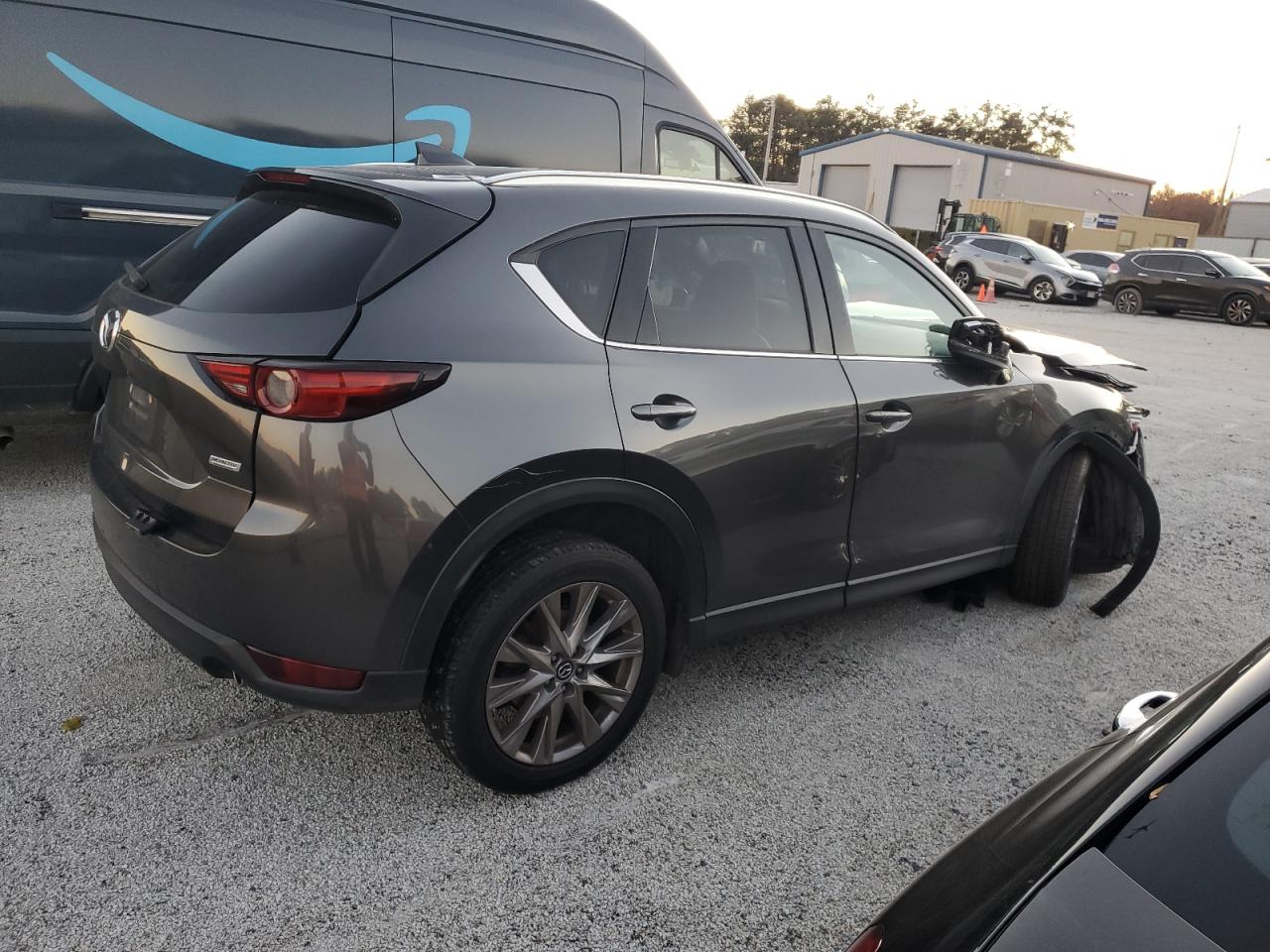2019 Mazda CX-5 VIN JM3KFADM3K0670288 Copart auction photo, front end / side damage thumbnail 3