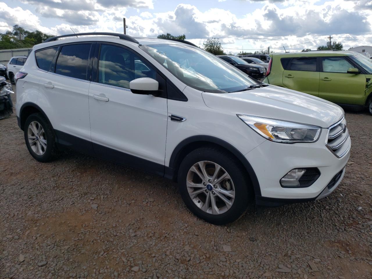 2018 Ford Escape VIN 1FMCU0GD8JUC10989 Copart auction photo, water/flood damage thumbnail 4