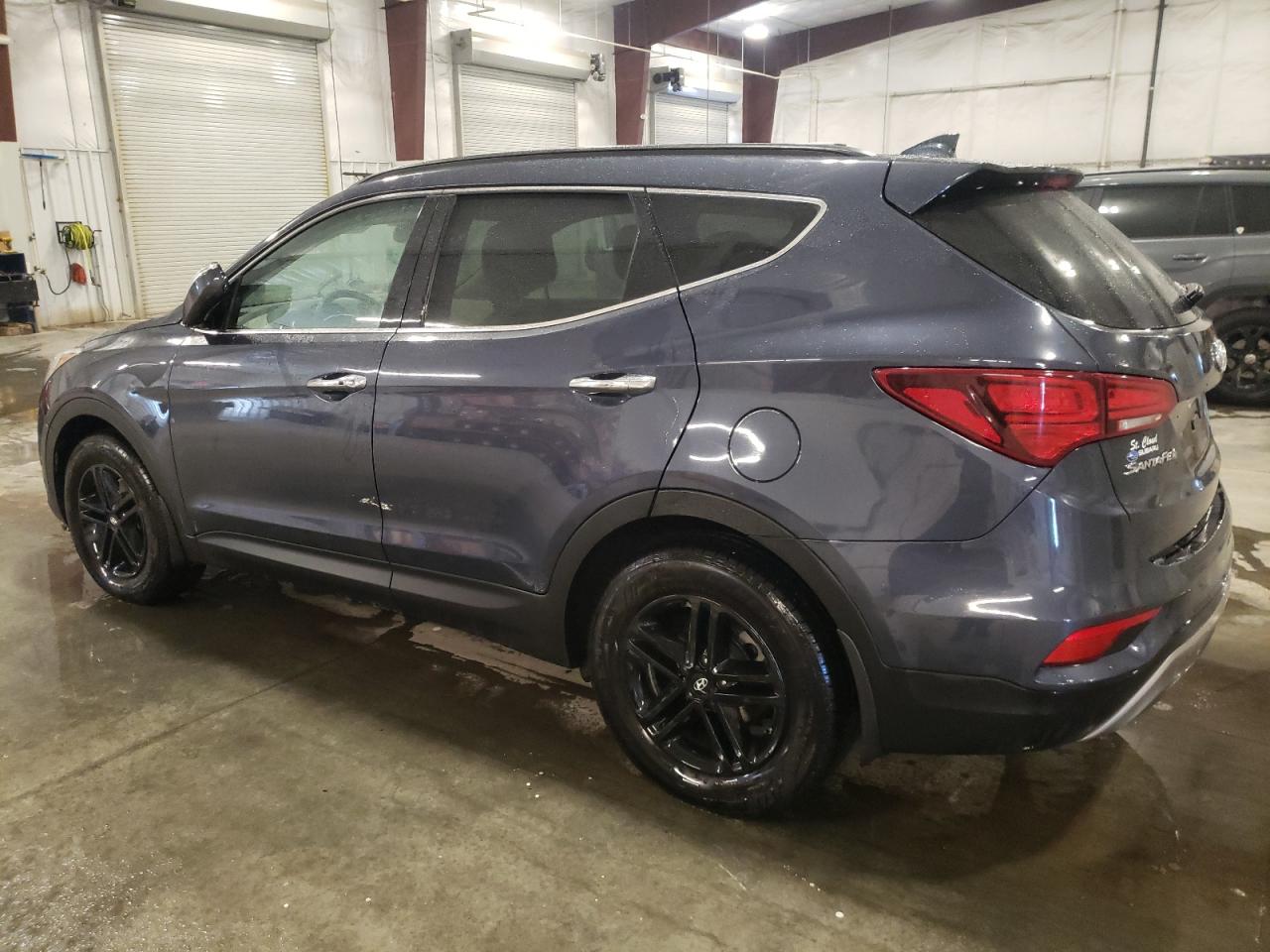 2017 Hyundai Santa Fe VIN 5NMZUDLB3HH017628 Copart auction photo, front end / undercarriage damage thumbnail 2