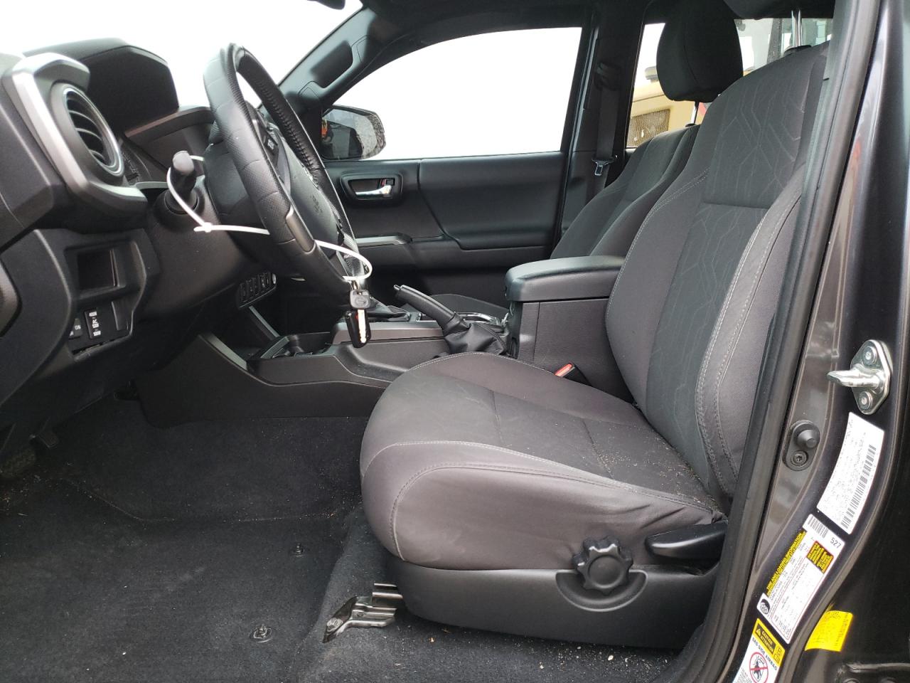 2016 Toyota Tacoma VIN 3TMDZ5BNXGM001130 Copart auction photo, all over damage thumbnail 7