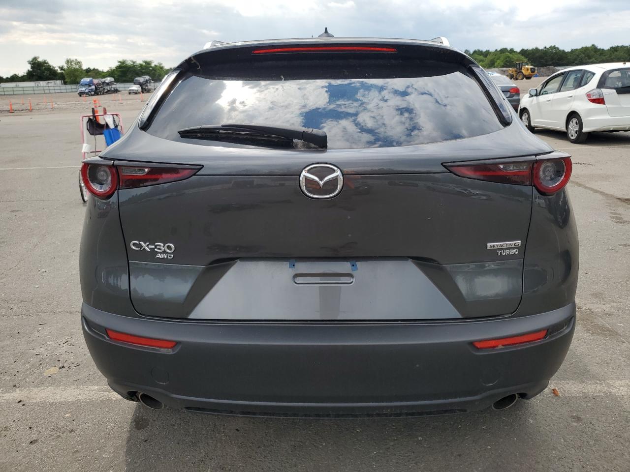 2023 Mazda CX-30 VIN 3MVDMBDY0PM569986 Copart auction photo, front end / rear end damage thumbnail 6
