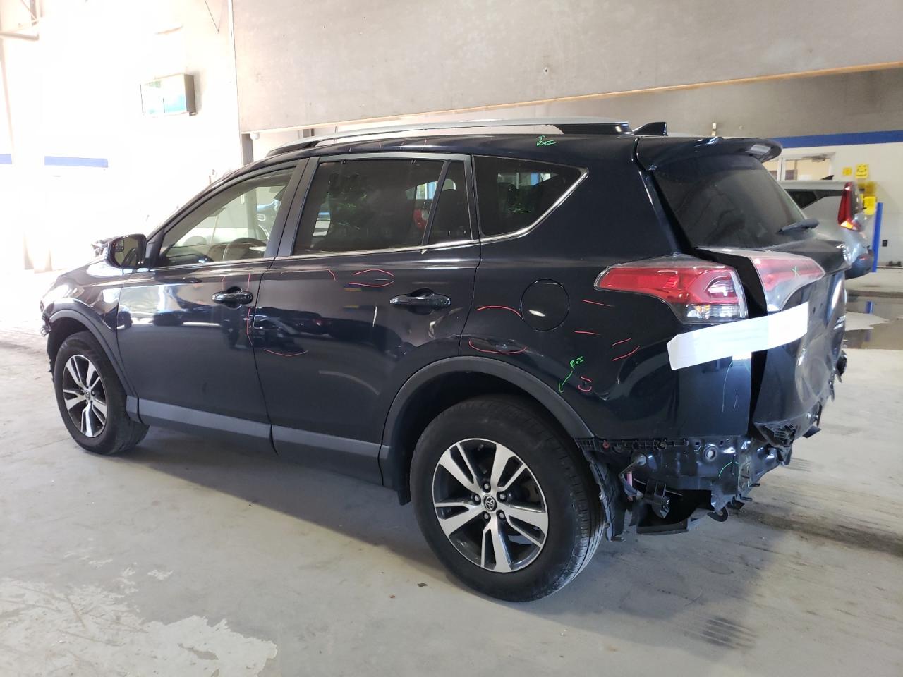 2017 Toyota RAV 4 VIN JTMRFREV9HD212057 Copart auction photo, front end / rear end damage thumbnail 2