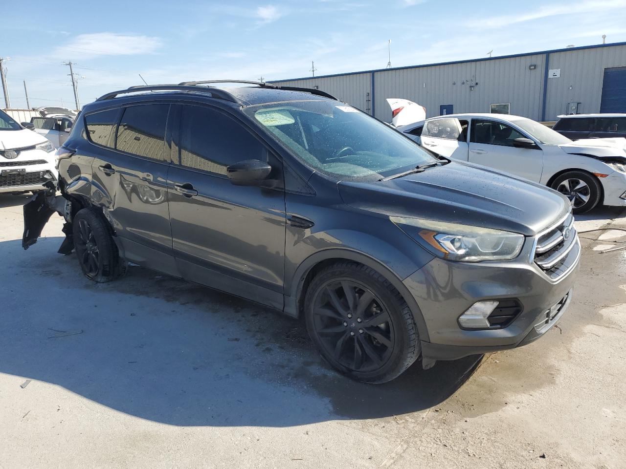 2017 Ford Escape VIN 1FMCU0G97HUD42373 Copart auction photo, side / rear end damage thumbnail 4