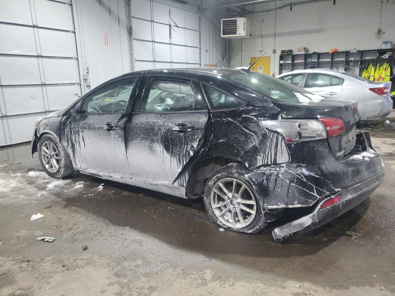 2016 Ford Focus VIN 1FADP3F24GL206685 Copart auction photo, side / rear end damage thumbnail 2