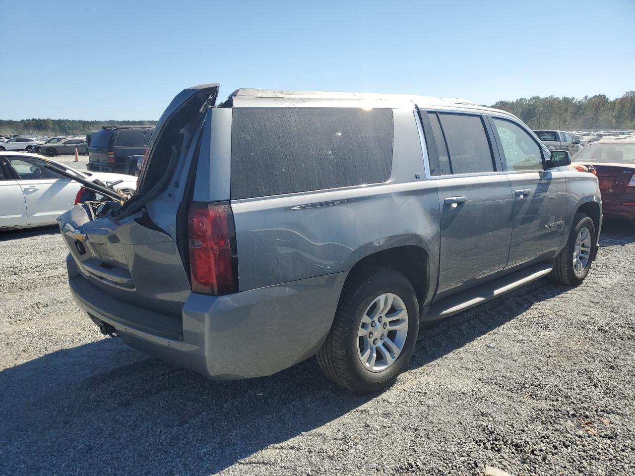 2019 Chevrolet Suburban VIN 1GNSKHKC7KR408123 Copart auction photo, all over damage thumbnail 3