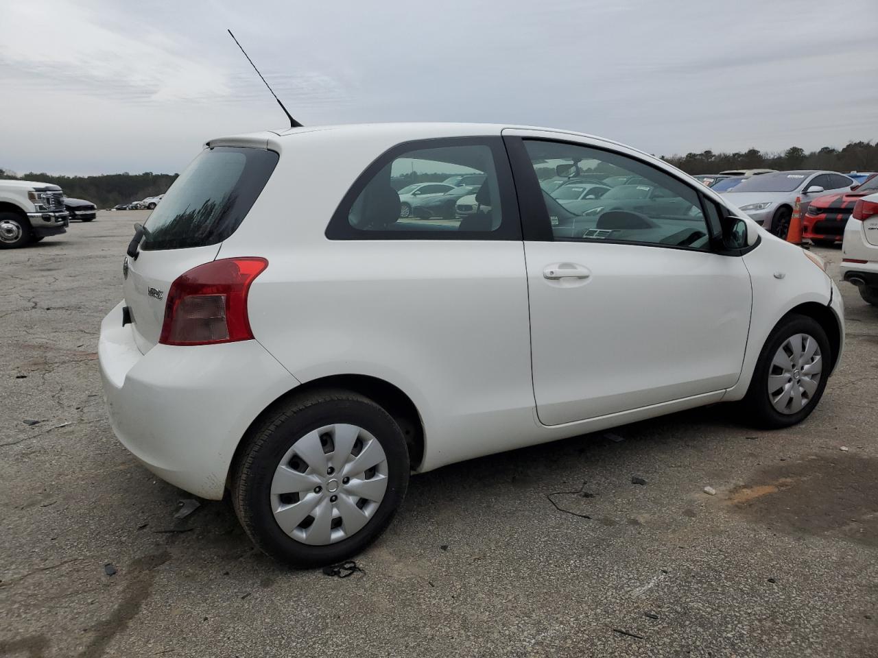 2007 Toyota Yaris VIN JTDJT923075047369 Copart auction photo, side damage thumbnail 3