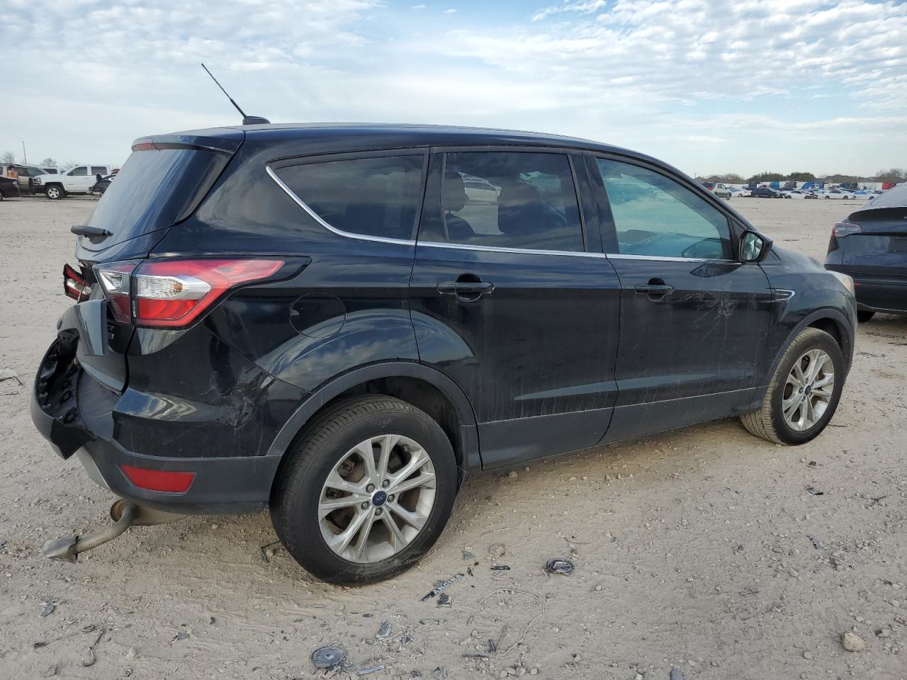 2017 Ford Escape VIN 1FMCU0G91HUB04583 Copart auction photo, rear end / minor dent/scratches damage thumbnail 3