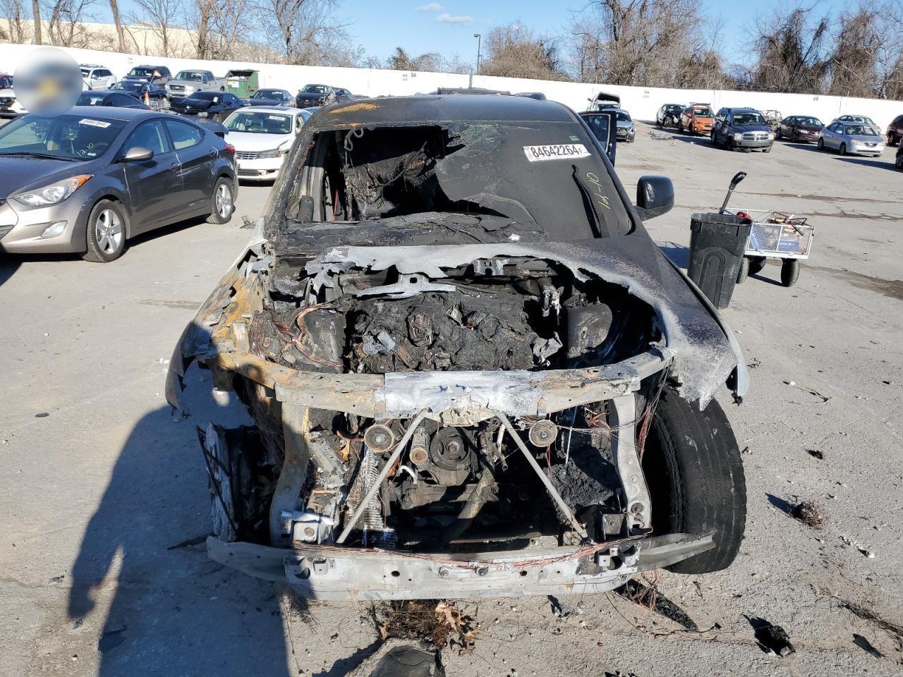 2019 Jeep Grand Cherokee VIN 1C4RJFAG0KC758442 Copart auction photo, burn damage thumbnail 5