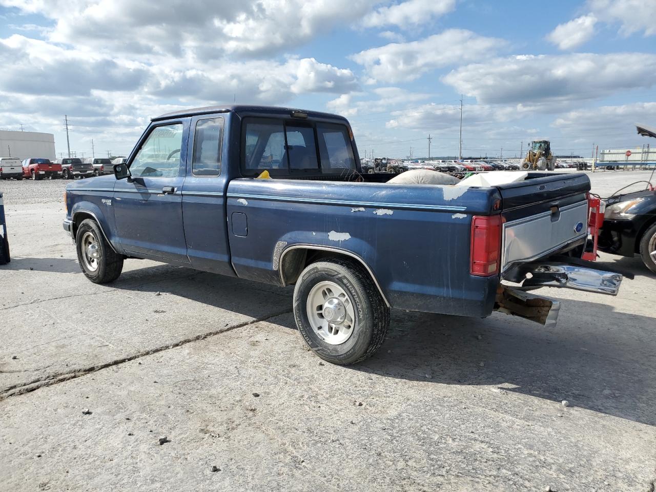 1991 Ford Ranger VIN 1FTCR14X4MPB18730 Copart auction photo, rear end / minor dent/scratches damage thumbnail 2
