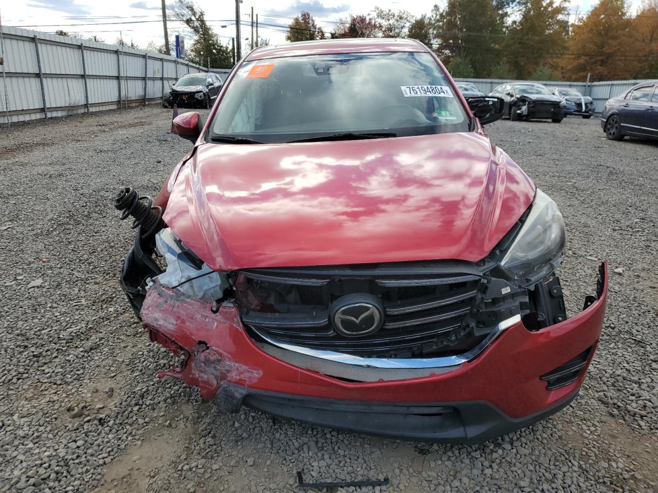 2016 Mazda CX-5 VIN JM3KE4DY2G0778156 Copart auction photo, front end / side damage thumbnail 5
