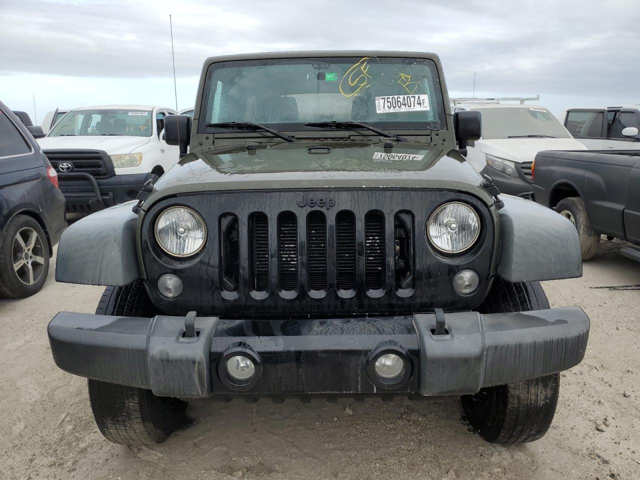 2016 Jeep Wrangler VIN 1C4BJWDG5GL103293 Copart auction photo, water/flood damage thumbnail 5