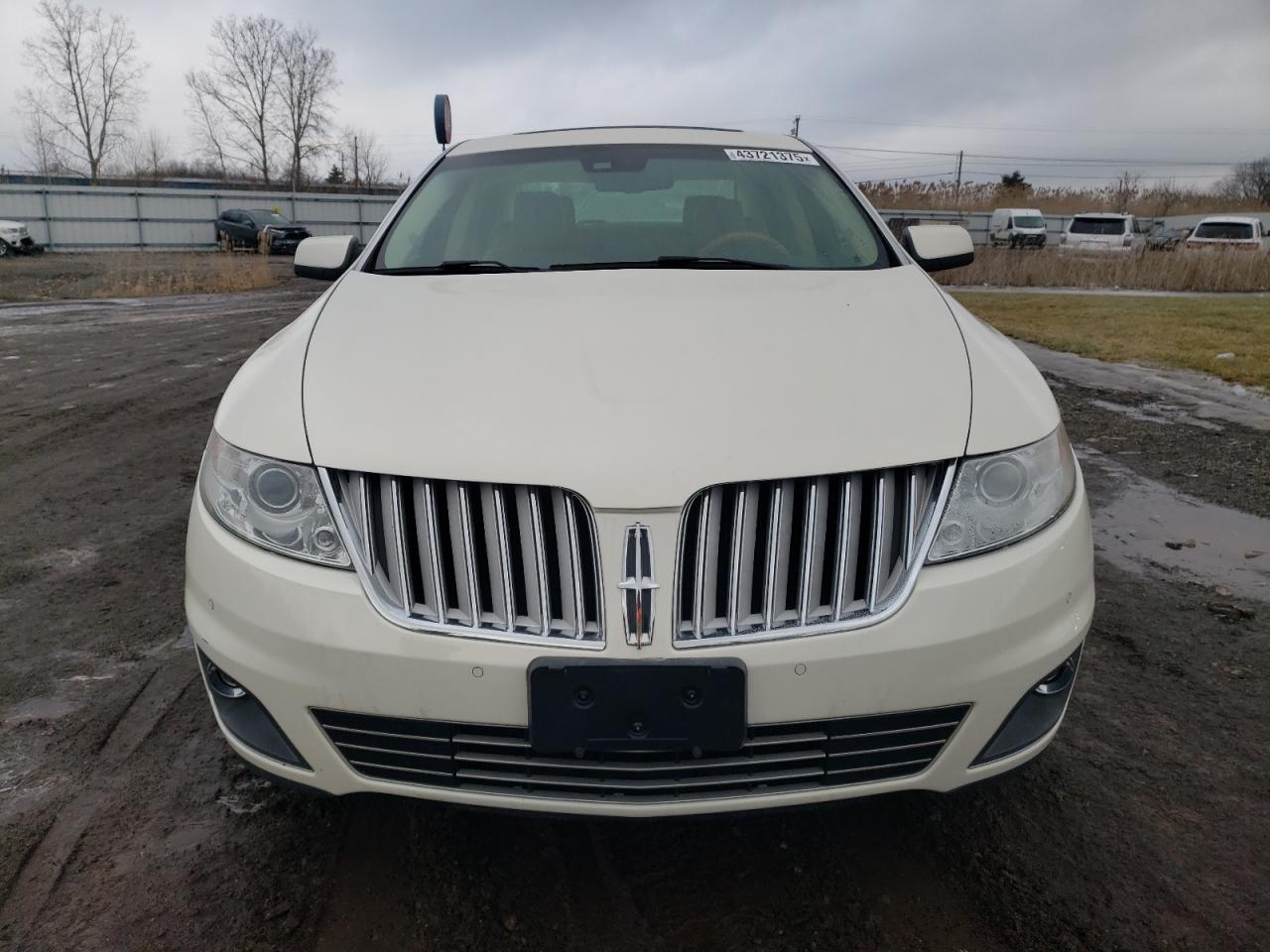 2009 Lincoln MKS VIN 1LNHM94R69G628584 Copart auction photo, side / rear end damage thumbnail 5