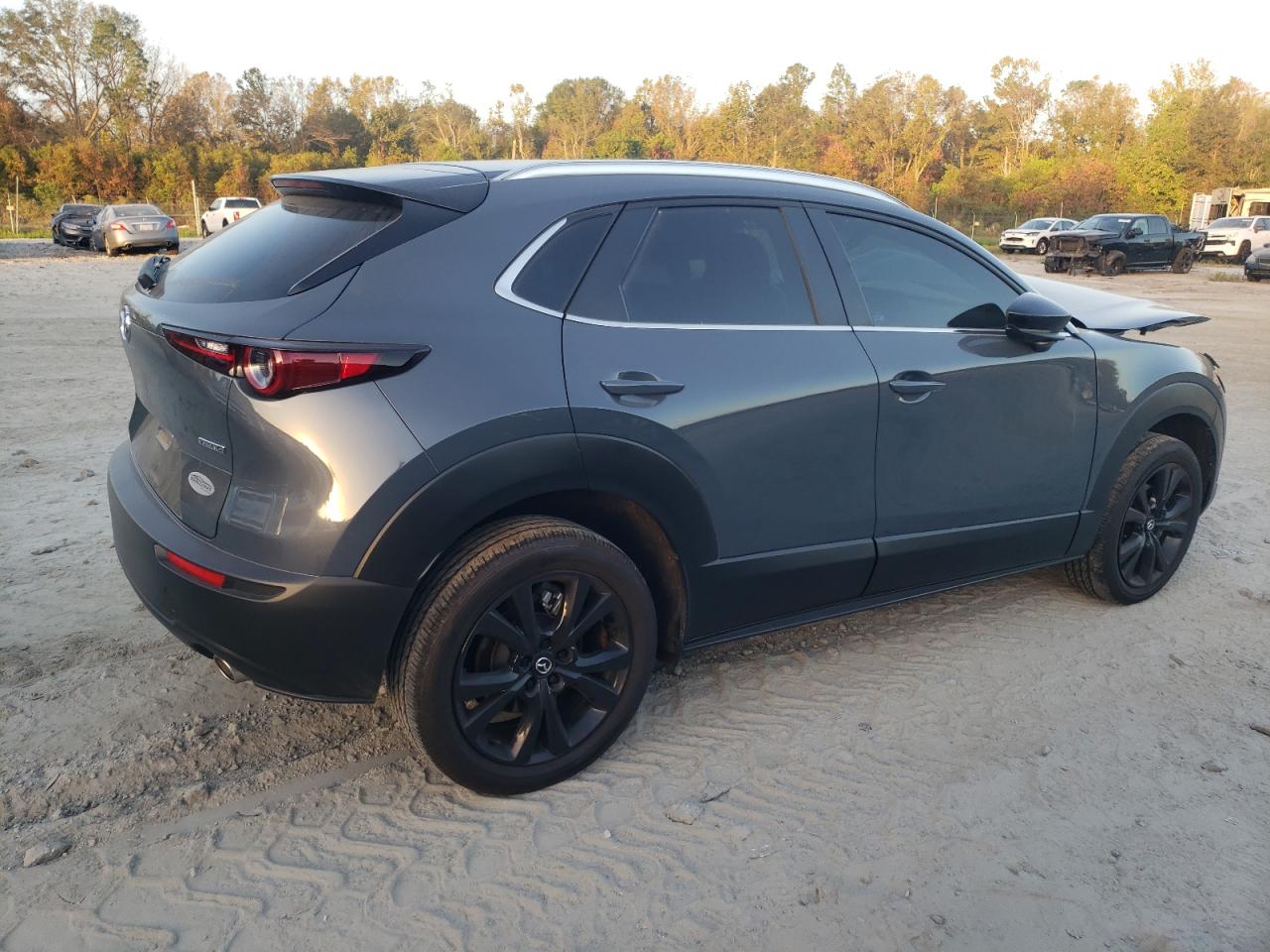 2023 Mazda CX-30 VIN 3MVDMBCM0PM586477 Copart auction photo, front end damage thumbnail 3