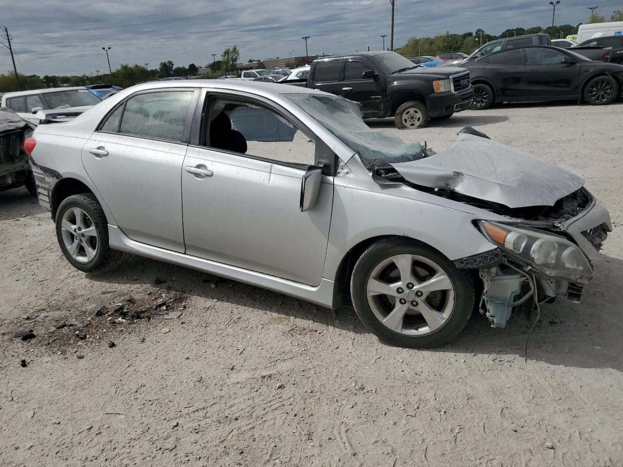 2011 Toyota Corolla VIN 2T1BU4EEXBC639889 Copart auction photo, side / all over damage thumbnail 4