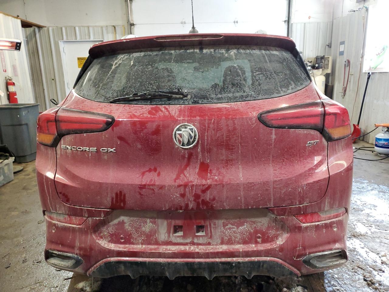 2021 Buick Encore VIN KL4MMDS20MB039218 Copart auction photo, undercarriage / minor dent/scratches damage thumbnail 6