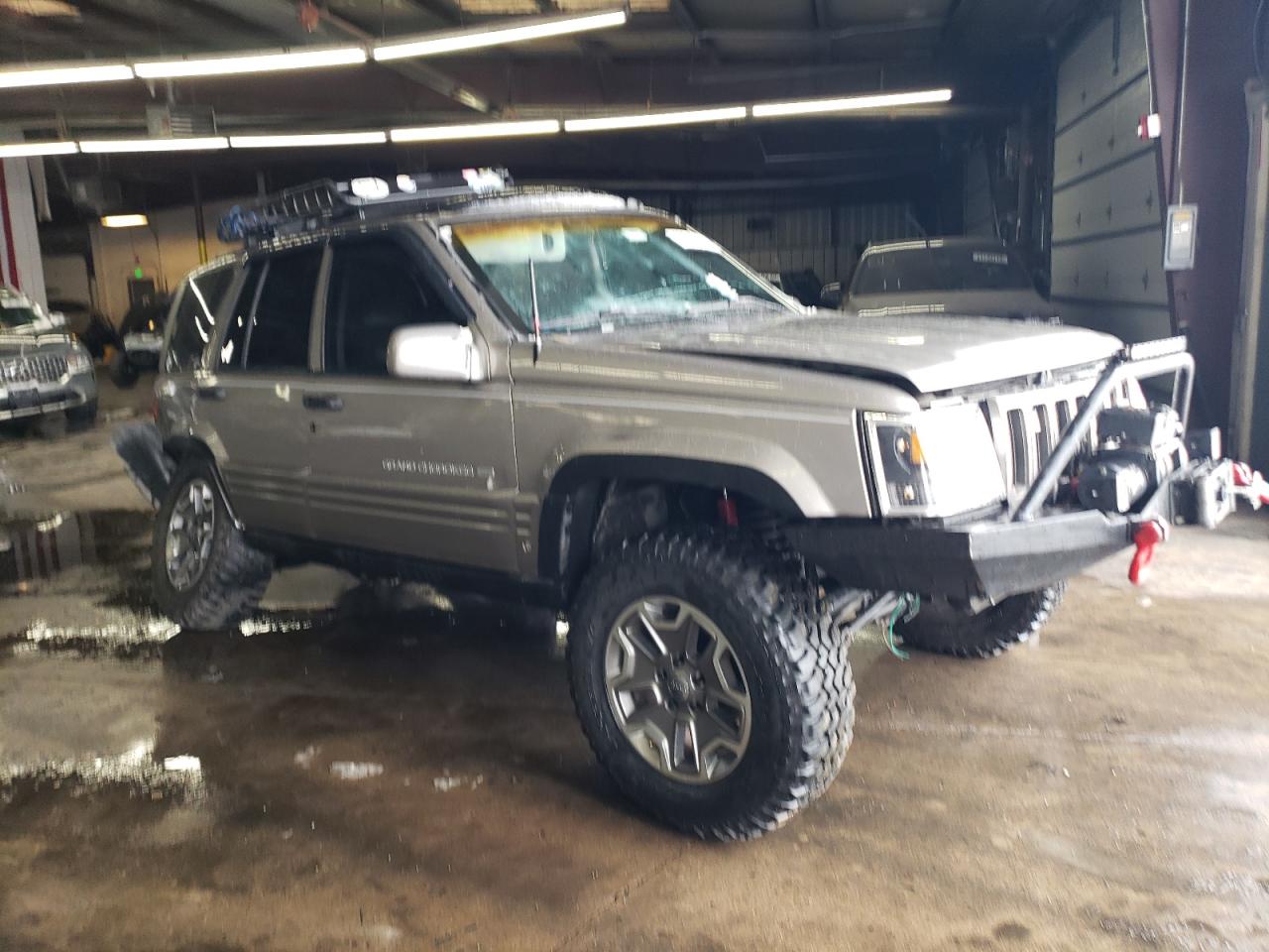 1998 Jeep Grand Cherokee VIN 1J4GZ78S9WC308708 Copart auction photo, all over damage thumbnail 4