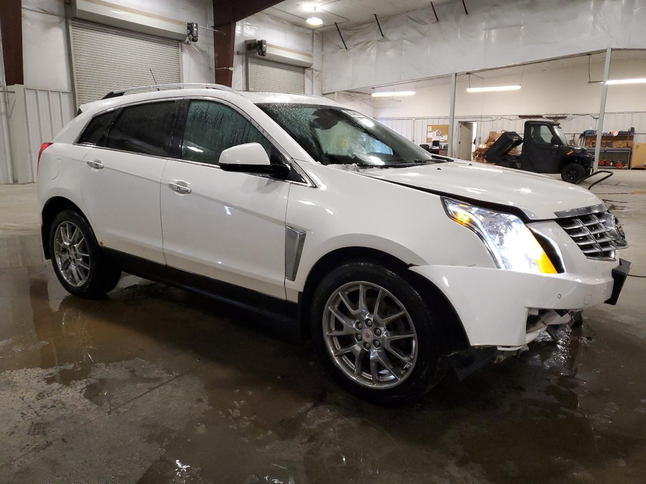2014 Cadillac SRX VIN 3GYFNGE36ES581361 Copart auction photo, front end / rear end damage thumbnail 4