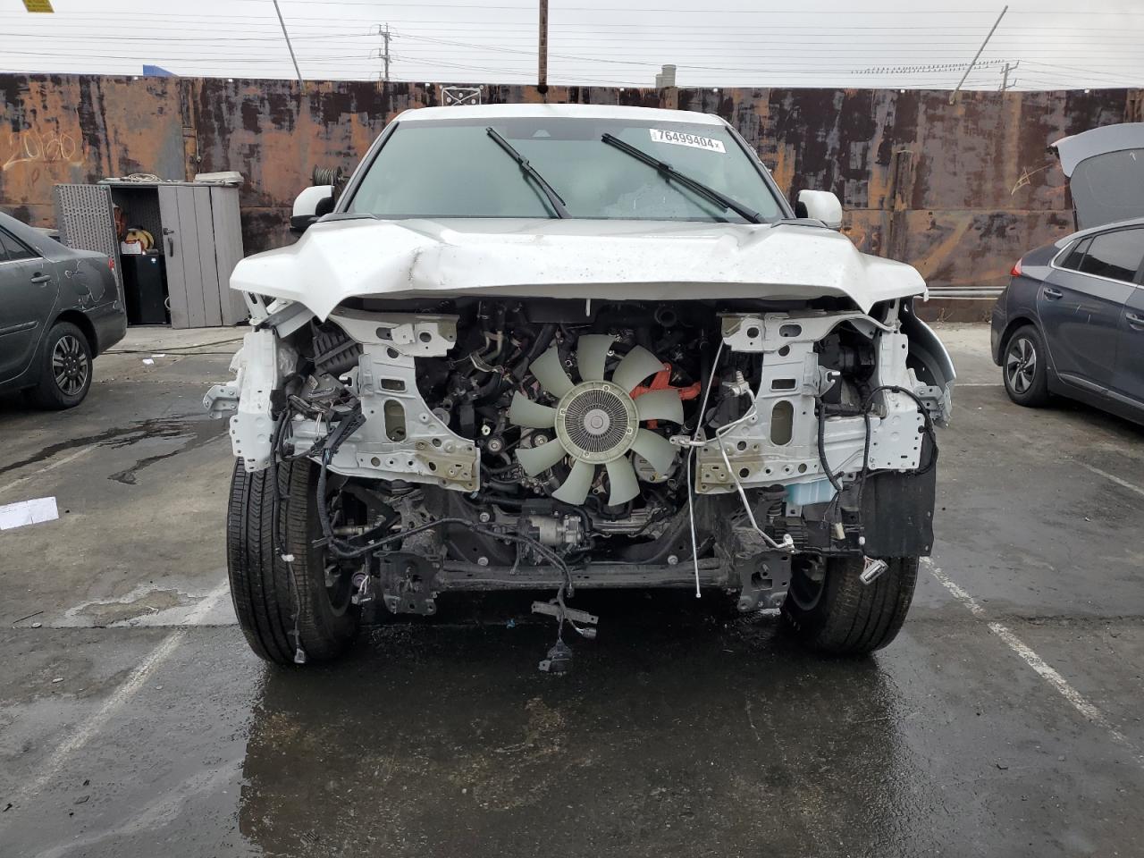 2022 Toyota Tundra VIN 5TFNC5AB7NX001526 Copart auction photo, front end / minor dent/scratches damage thumbnail 5