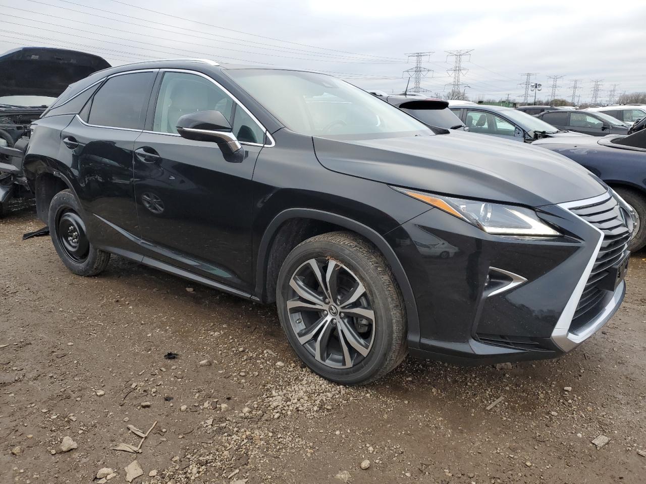 2019 Lexus RX VIN 2T2BZMCA5KC207773 Copart auction photo, rear end / minor dent/scratches damage thumbnail 4