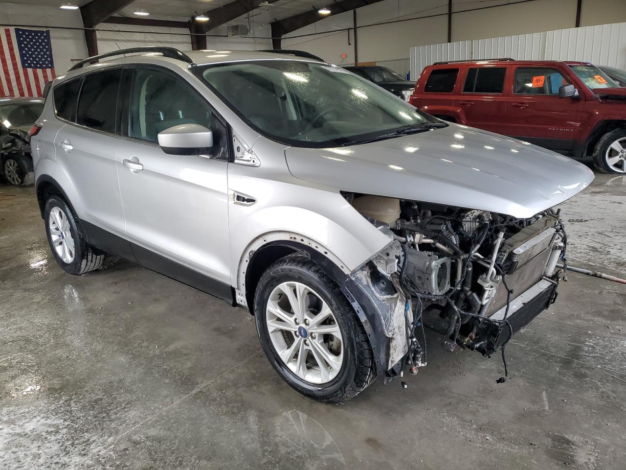 2018 Ford Escape VIN 1FMCU0GD9JUC40664 Copart auction photo, front end damage thumbnail 4