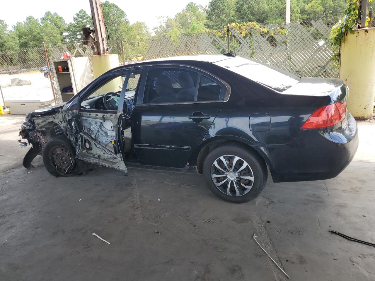 2009 KIA Optima VIN KNAGE228595315713 Copart auction photo, side / front end damage thumbnail 2