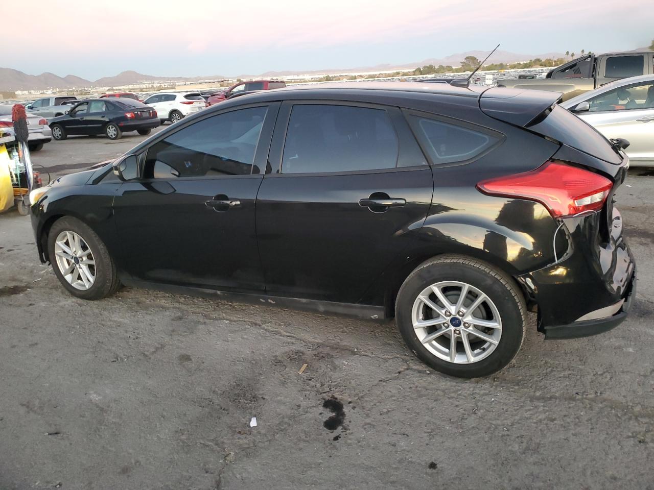2015 Ford Focus VIN 1FADP3K23FL326174 Copart auction photo, rear end damage thumbnail 2
