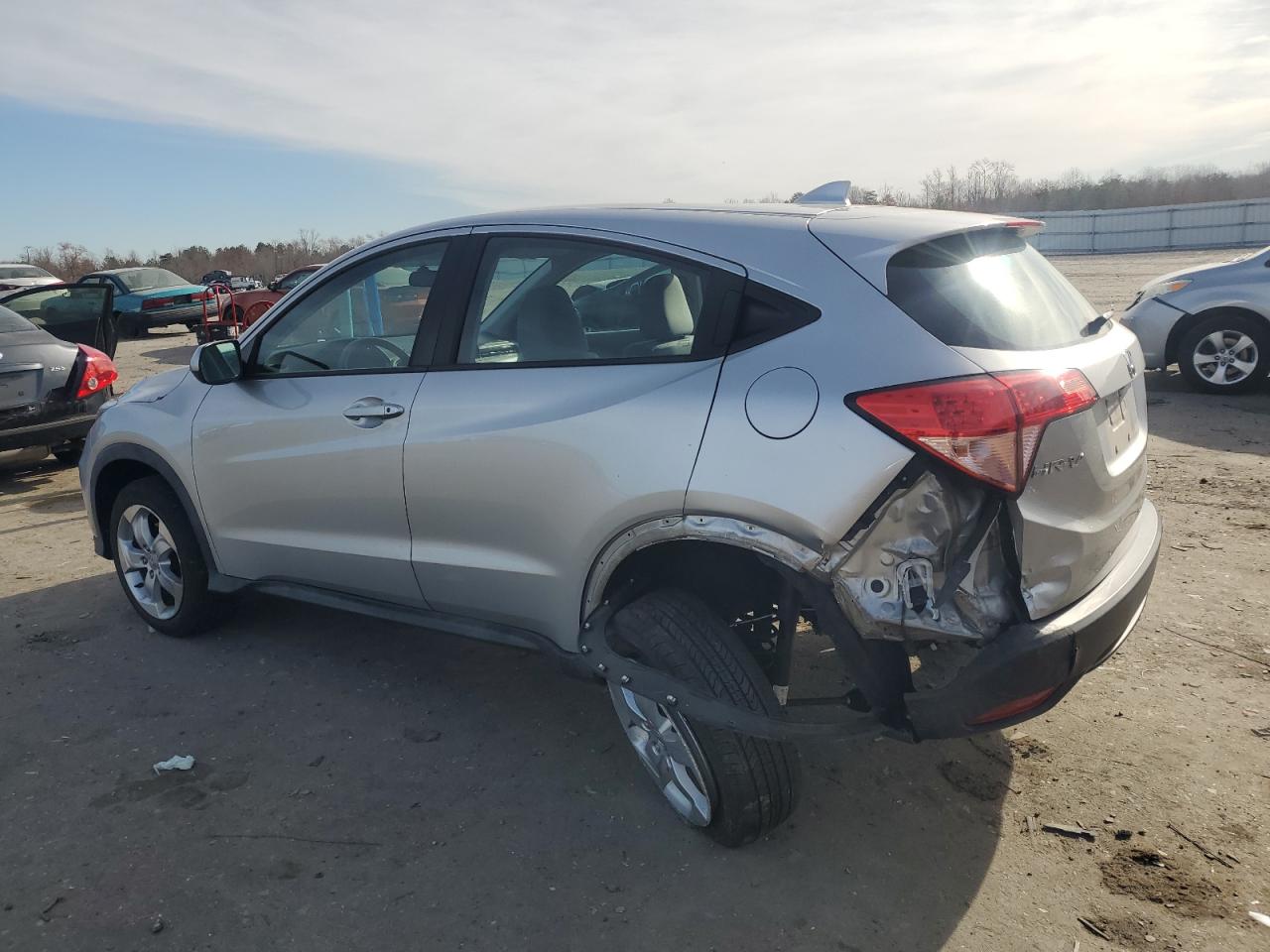2016 Honda HR-V VIN 3CZRU6H30GM736077 Copart auction photo, rear end / undercarriage damage thumbnail 2