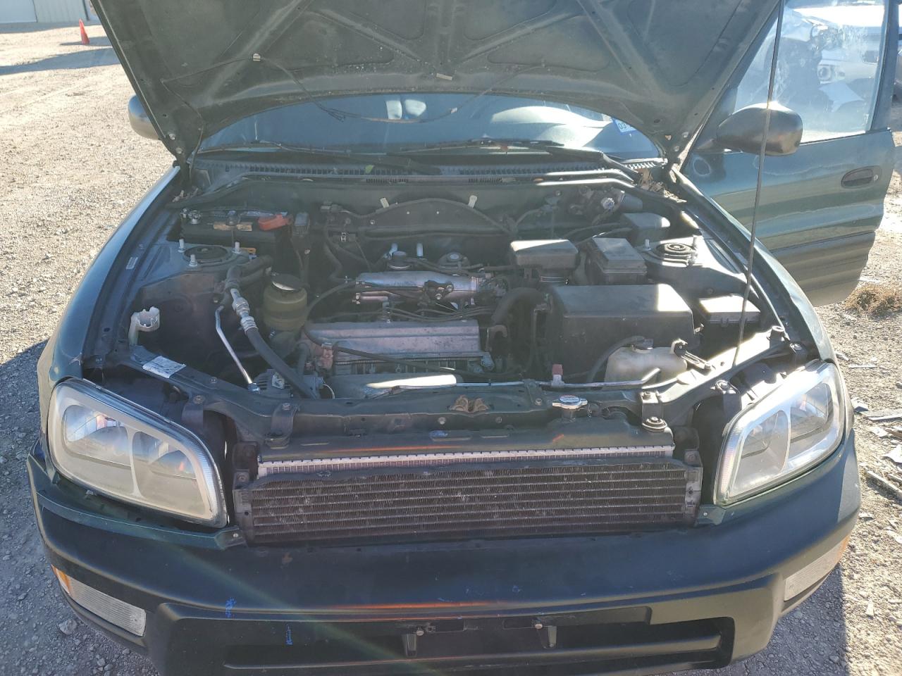 1998 Toyota RAV 4 VIN JT3GP10V7W7025929 Copart auction photo, mechanical damage thumbnail 12